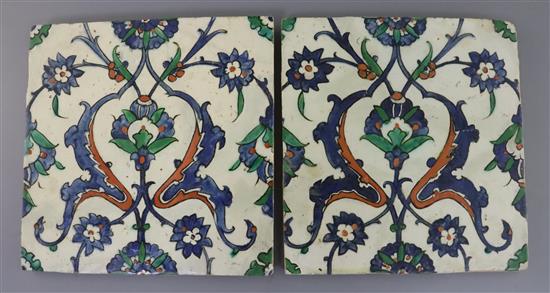 A pair 17th century Ottoman polychrome glazed fritware tiles, 10 x 9.25in., some restoration